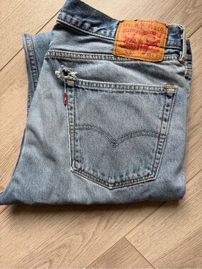 Levi's Light Blue Denim Jeans with Tan Leather Patch